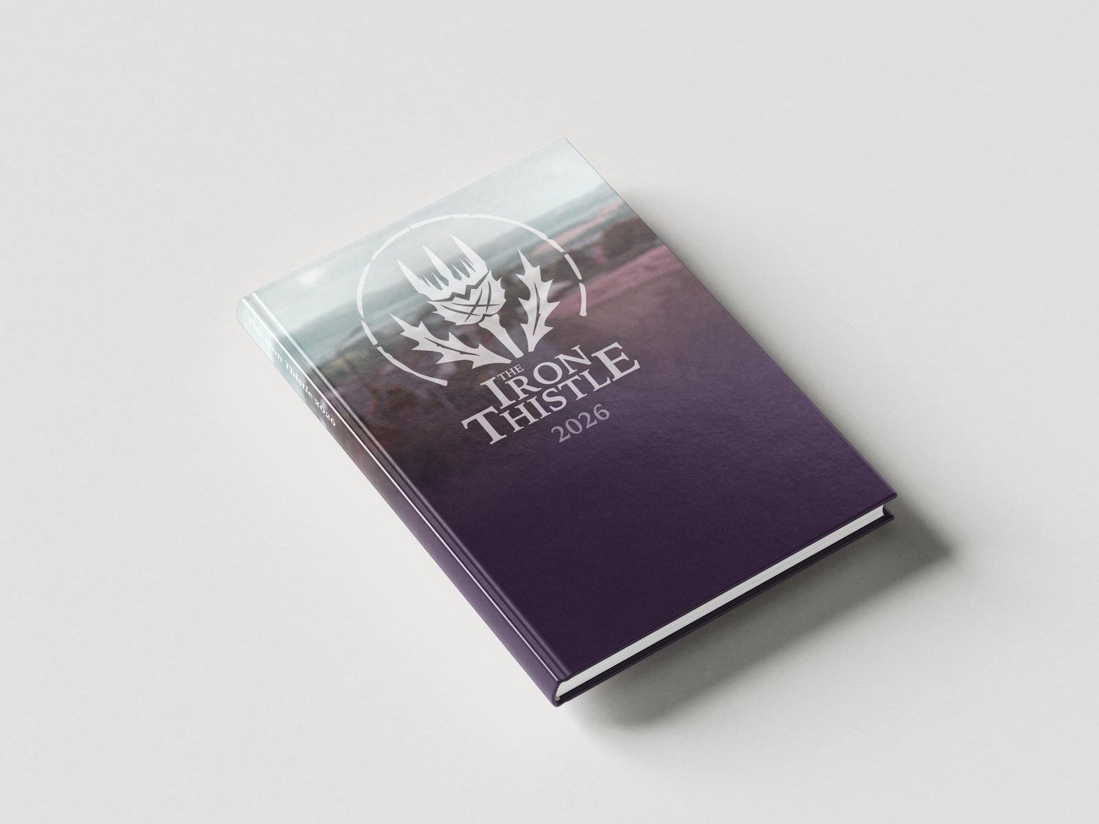 The Iron Thistle 2026 annual, a hardback book with a purple cover